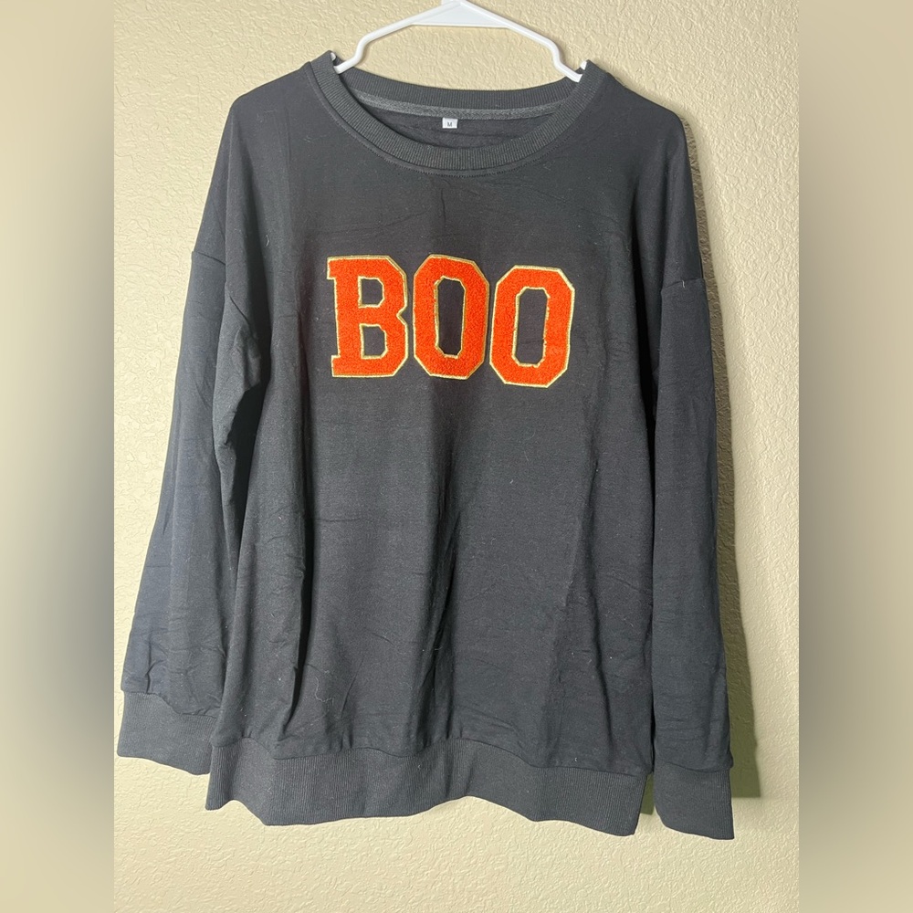 Black Sweatshirt with Orange 'BOO' Design
